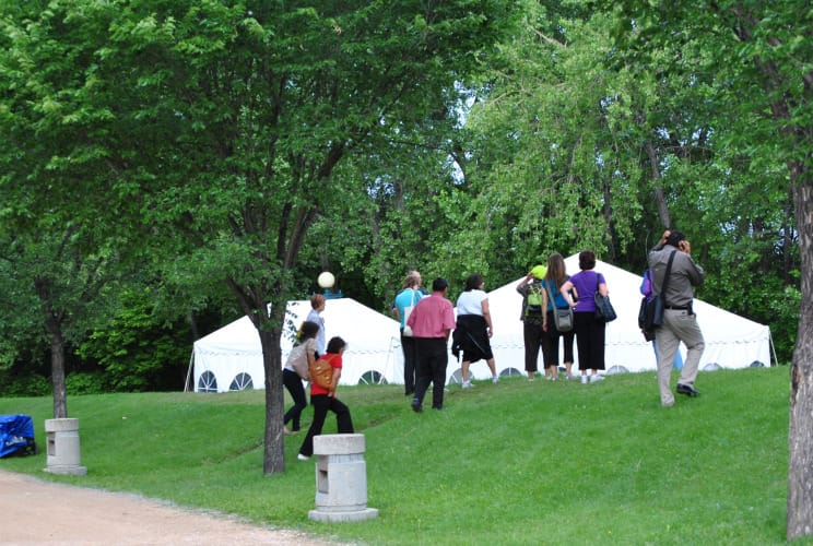 Participants check out various tents at The Forks in Winnipeg, where the first TRC national event is being held.Photo: Marites Sison