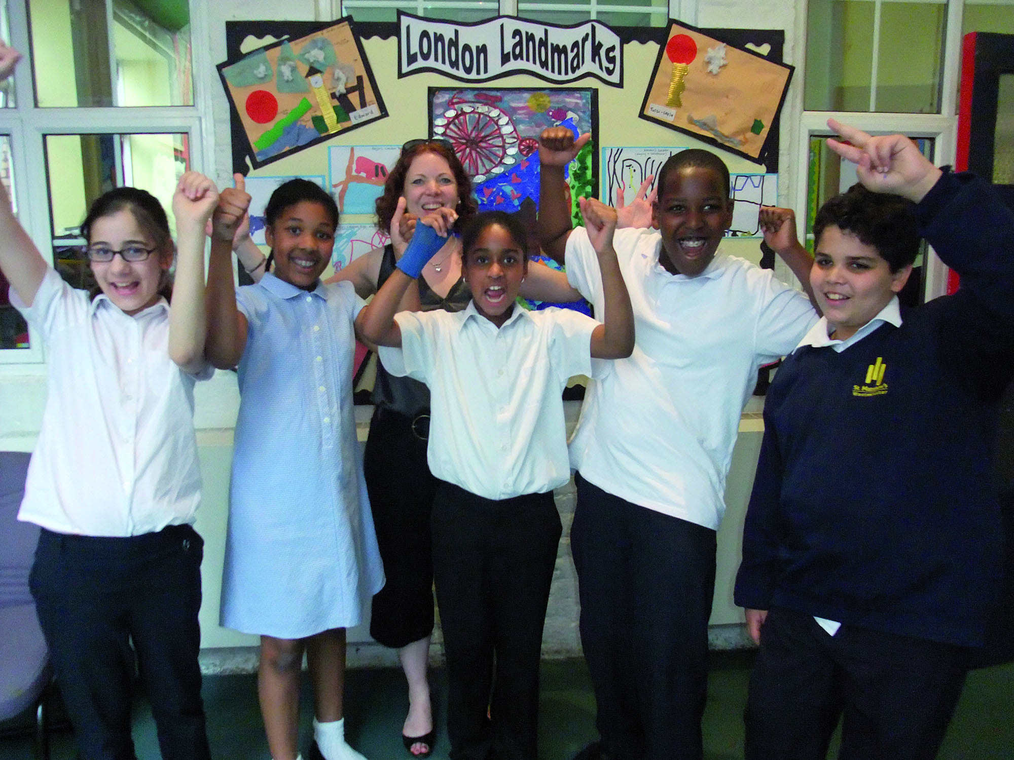 Head teacher Emily Norman and students at St. Matthew's, Westminster, get ready to celebrate the jubilee this weekend. Photo: churchofengland.org