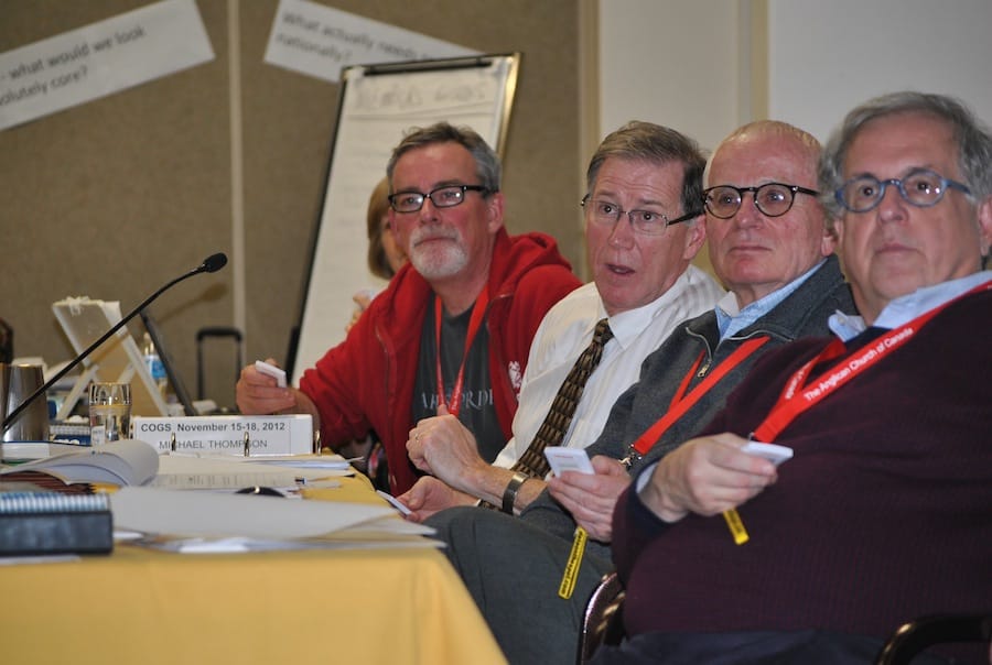 (l to r) Archdeacon Michael Thompson, Archbishop Fred Hiltz, Council of General Synod prolocutor Robert Falby and Chancellor David Jones test the voting device. Photo: Marites N. Sison