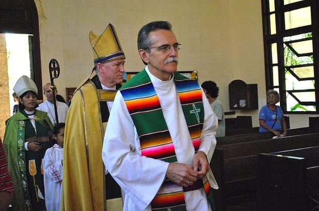 Diocese of Uruguay Bishop-elect Michael Pollesel (right) at an Episcopal diocese of Cuba service in 2011. Behind him are Anglican Church of Canada primate, Archbishop Fred Hiltz, and Diocese of Cuba bishop Griselda Delgado del Carpio. Photo: Andrea Mann/General Synod Communications