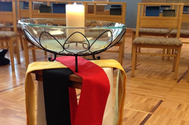 Chapel of the Holy Apostles at the Anglican Church of Canada’s national office commemorates National Aboriginal Day with a Eucharist and a display of aboriginal colours on the altar side table. Photo: Marites N. Sison
