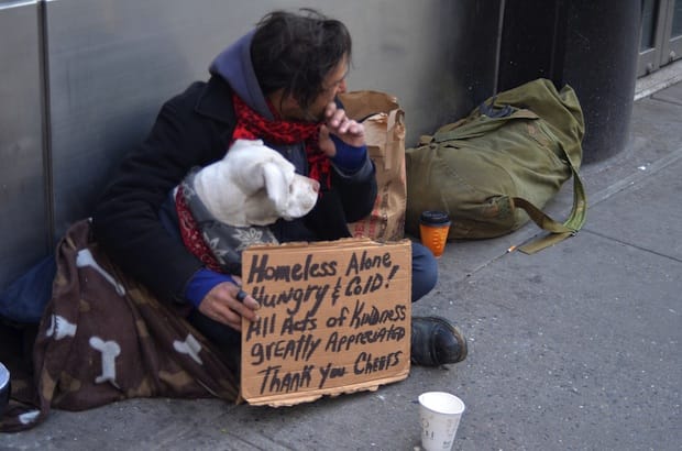 A homeless man seeks help. Photo: Anton Oparin/Shutterstock