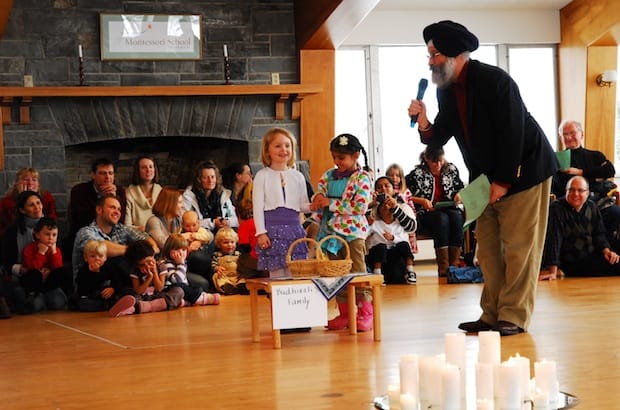 Ralph Singh, author of Stories to Light Our Way, reads to school children and their parents. Photo: Courtesy of Ralph Singh