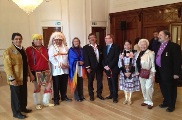 Bishop Mark MacDonald (right) and Leona Moses (second from right), join members of an indigenous delegation that marked the 250th anniversary of the Royal Proclamation of 1763 in London, England. Photo: Contributed