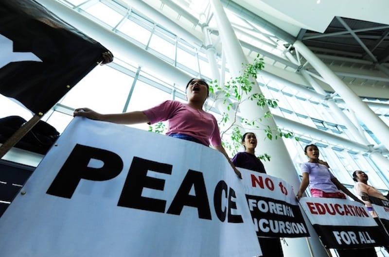 A call to work for justice and peace during the Asian plenary. Photo: Peter Williams/WCC