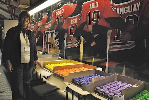 Henriette Thompson, director, public witness for social & ecological justice, with cupcakes baked by parish members at the 2011 TRC Atlantic National Event to honour former students who weren't able to celebrate their birthdays at residential schools. Photo: Marites N. Sison