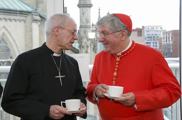 (L to R) The Archbishop of Canterbury, Justin Welby, and the Roman Catholic Archbishop of Toronto, Cardinal Thomas Collins, at an ecumenical reception in St. James Cathedral Centre. Welby visited the Anglican Church of Canada April 7 to 8. Photo: Michael Hudson