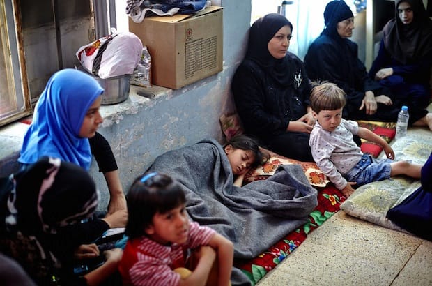 A family shelters in a primary school in Alqosh, Duhok after fleeing their home in Mosul. Photo: UNHCR/S. Baldwin.