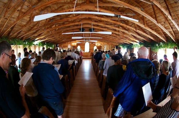 An ecumenical congregation of 200 packed St. Peter’s pews for the Anglican service, while almost 300 more worshipped outdoors. Photo: Ken Powell Photography