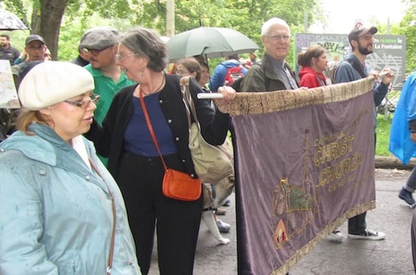 In Montreal, a contingent of 15 parishioners from Christ Church Cathedral in Montreal, including the Rev. Canon Peter Huish, participated in a march of about 1,500 people from one large park to another. Photo: Harvey Shepherd
