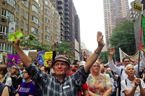Don Robinson, a member of St. John’s Episcopal Church in Northampton, Mass., were among the more than 300,000 people “of all faiths and none,” who joined the People’s Climate March Sept. 21, according to the Episcopal News Service. Photo: Amy Sowder