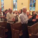Congregation offers a rousing rendition of When The Saints Go Marching In at the Peterborough Covenant service Sept. 21. Photo: Murray MacAdam