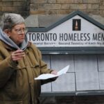 Bonnie Briggs, founder of the Toronto Homeless Memorial, reads a poem in honour of those who have died on the street. Photo: André Forget.