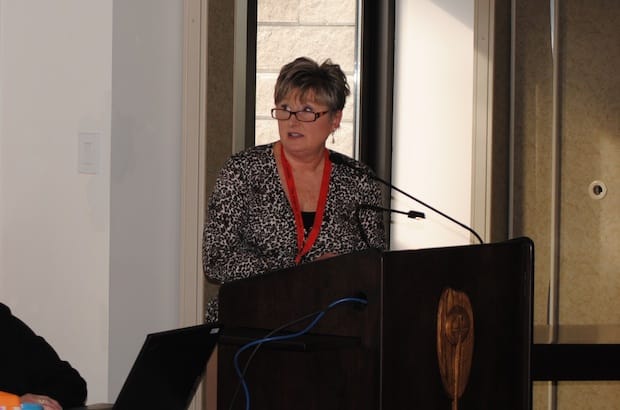General Synod Treasurer Hanna Goschy presents the 2015 budget, which projects a surplus of $59,000. Photo: André Forget