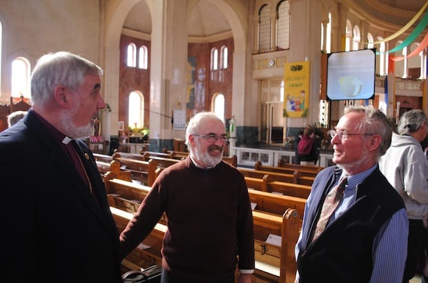 Bishop Dennis Drainville of the Anglican diocese of Quebec talks with workshop leader Paul Mackey and atmospheric scientist Alan Betts at the Green Churches Conference in Quebec City. Photo: André Forget