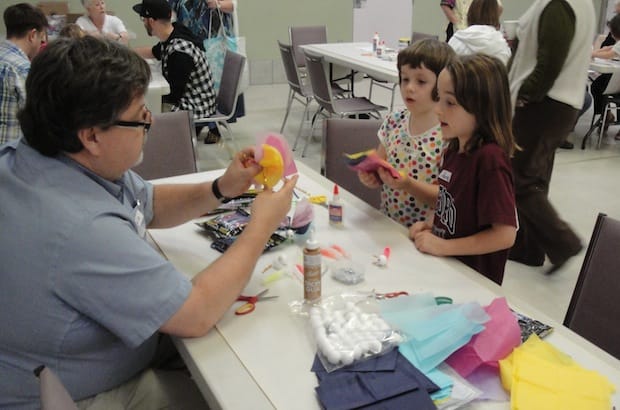 The Rev. David Anderson of St. John the Evangelist Church in Hamilton, Ont., leads a crafts table. Photo: Contributed