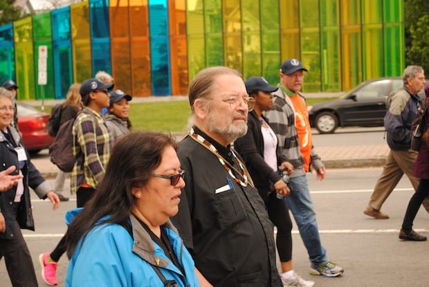 National Indigenous Bishop Mark MacDonald and the Rev. Ruth Kitchekeesik take part in the Walk for Reconciliation at the beginning of the final Truth and Reconciliation Commission event in Ottawa. Photo: André Forget