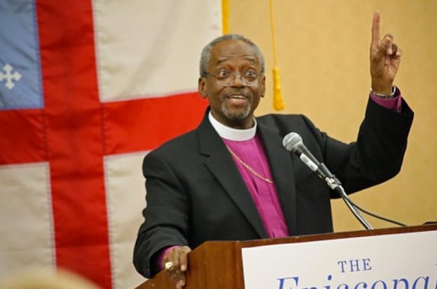 Presiding Bishop-elect Michael Curry makes a point at his first news conference a few hours after his historic election as the 27th presiding bishop of The Episcopal Church. Photo: Janet Kawamoto / For Episcopal News Service
