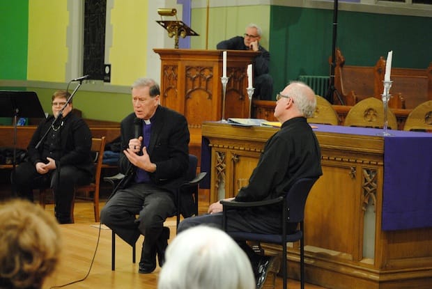 Archbishop Fred Hiltz responds to a question from Canon Douglas Graydon during a question and answer session at St. John's West Toronto. Photo: André Forget