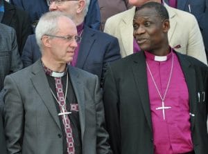 Welby, left, and Bishop Josiah Idowu-Fearon, Anglican Communion secretary general, have each said the Anglican Consultative Council endorsed certain consequences imposed on the Episcopal Church by the Communion's 38 primates. Their interpretation has been rejected by some ACC members.  Photo: Mary Frances Schjonberg/Episcopal News Service
