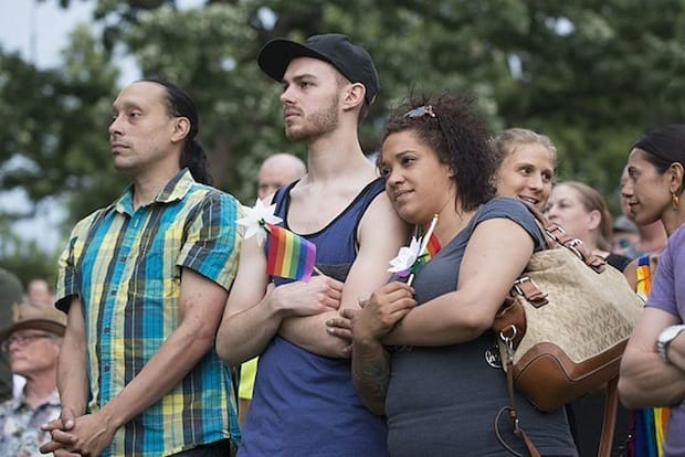 Mourners gather in Minneapolis to remember the 49 who were killed and the 53 who were wounded in the Pulse Nightclub shooting June 12 in Orlando, Fla. Photo: Fibonacci Blue/Wikimedia Commons