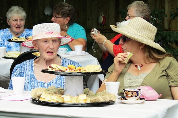 Sharon Day and Peggy Boucher enjoy tea and conversation during the annual garden party at Farraline Place. Photo: Gisele McKnight