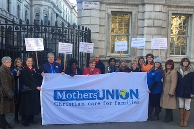 Members of the Mothers' Union deliver their petition to 10 Downing Street. Photo: Rachael Arding/Mothers' Union