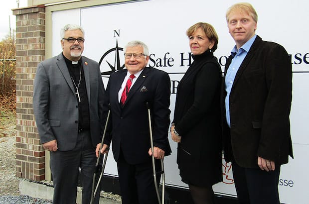 Fredericton Bishop David Edwards, MLA and cabinet minister Ed Doherty, Safe Harbour board treasurer Kit Hickey, and CEO of Partners for Youth John Sharpe after the government announcement of new funding for Safe Harbour House. Photo: Gisele McKnight