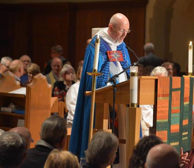 Peter Elliott , dean and rector of Christ Church Cathedral, gives an opening address. Photo: Randy Murray