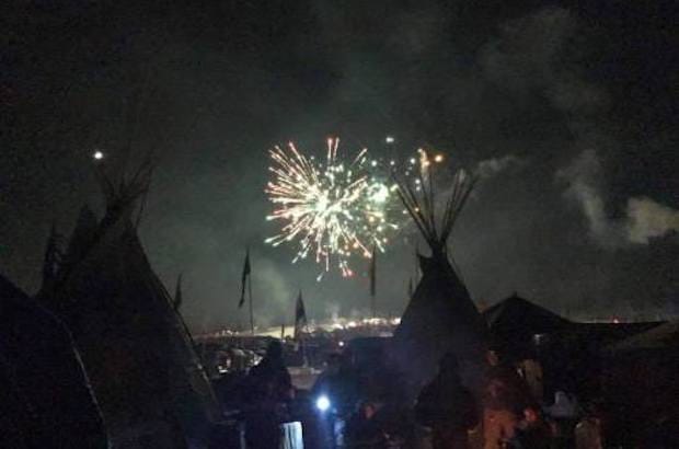 Fireworks mark celebration over the Oceti Sakowin Camp following the U.S. federal government's Dec. 4 announcement that it would not allow the Dakota Access Pipeline to cross the Missouri River at Lake Oahe. Photo: Michael Pipkin/Facebook