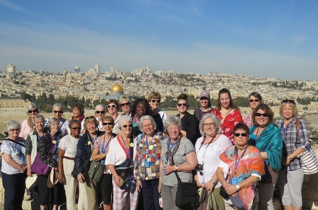 Members of the diocese of Ottawa's Women's Conference and Pilgrimage to Jerusalem gather on top of the Mount of Olives, overlooking the Dome of the Rock and the Old City of Jerusalem. Photo: Susan Lomas