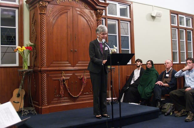 Diocese of New Westminster Bishop Melissa Skelton reads two poems about love and kindness during a multi-faith gathering at Or Shalom Synagogue. Photo: Neale Adams