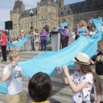 Anglicans and Lutherans hold a prayer service on Parliament Hill in 2013, urging the government to provide clean water for all. File photo: Art Babych