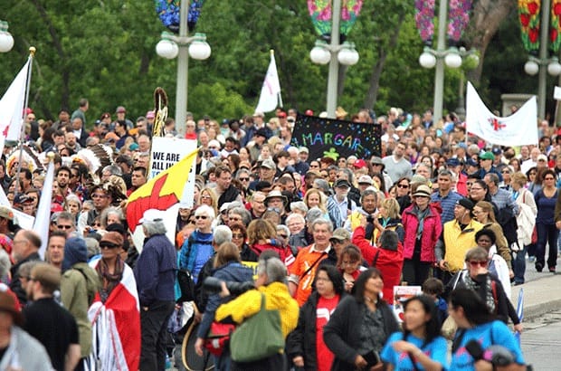 Between 7,000 and 10,000 people from across Canada marched from Gatineau to Ottawa as part of the launch of the final event of Canada's Truth and Reconciliation Commission, May 31 to June 3, in Ottawa. Photo: Art Babych