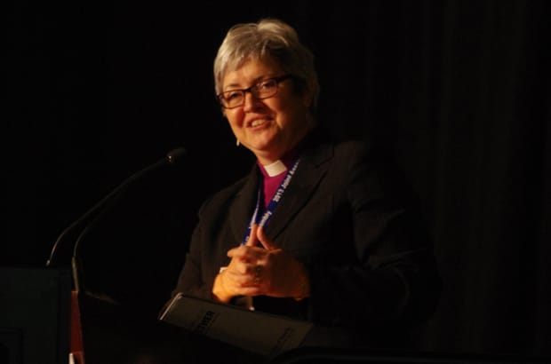 Bishop Susan Johnson addresses the delegates at the 14th Biennial National Convention in Ottawa. Photo: Simon Chambers