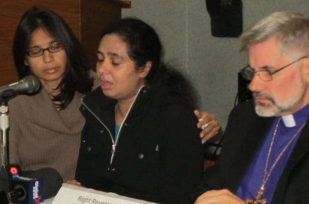 Tahira Malik (middle) talks about the plight of her ailing mother, Khurshid Begum Awan. Beside her are Anglican diocese of Montreal Bishop Barry Clarke (left) and Rushdia Mehreen, who acted as interpreter. Photo: Harvey Shepherd