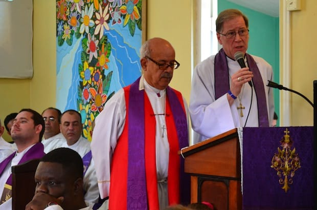 (Ret.) Bishop Antonio Ramos of the Episcopal diocese of Costa Rica (left) translates for Archbishop Fred Hiltz, primate of the Anglican Church of Canada, (right) during the synod of the Episcopal Church of Cuba. Photo: Andrea Mann