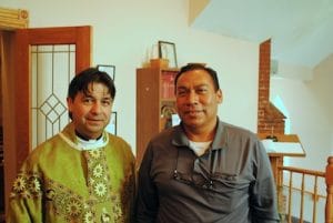 The Rev. Javier Arias and Luis.