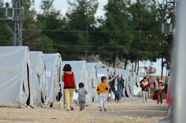 Young Syrian refugees in a camp in Suruc, Turkey, which hosts about 35,000 people in 7,000 tents. Photo: Procyk Radek/Shutterstock