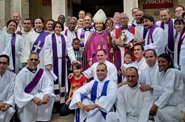Members of the Episcopal Church of Cuba synod and guests gather outside the Holy Trinity Episcopal Cathedral in Havana. Photo: Andrea Mann