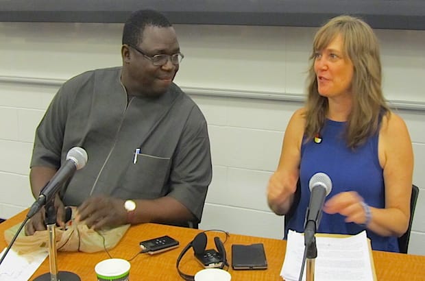 Panelists Fr. John Patrick Ngoyi, director of the Commission for Justice, Development and Peace, Nigeria, and Jennifer Henry, executive director of KAIROS, at the World Social Forum. Photo: Harvey Shepherd