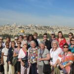 Members of the diocese of Ottawa's Women's Conference and Pilgrimage to Jerusalem gather on top of the Mount of Olives, overlooking the Dome of the Rock and the Old City of Jerusalem. Photo: Susan Lomas