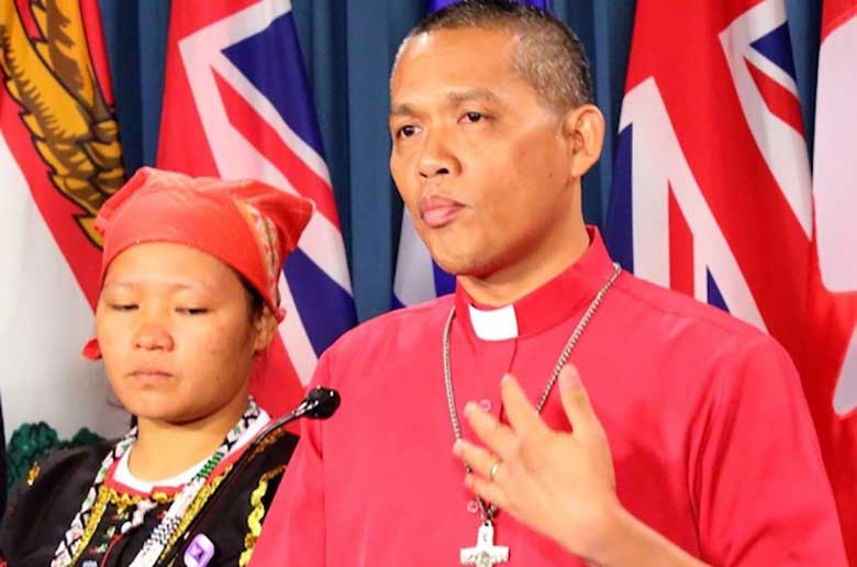 Nenita Condez, Indigenous peoples leader, and Bishop Antonio Ablon of the Philippines at a news conference on Parliament Hill March 23. Photo: Art Babych